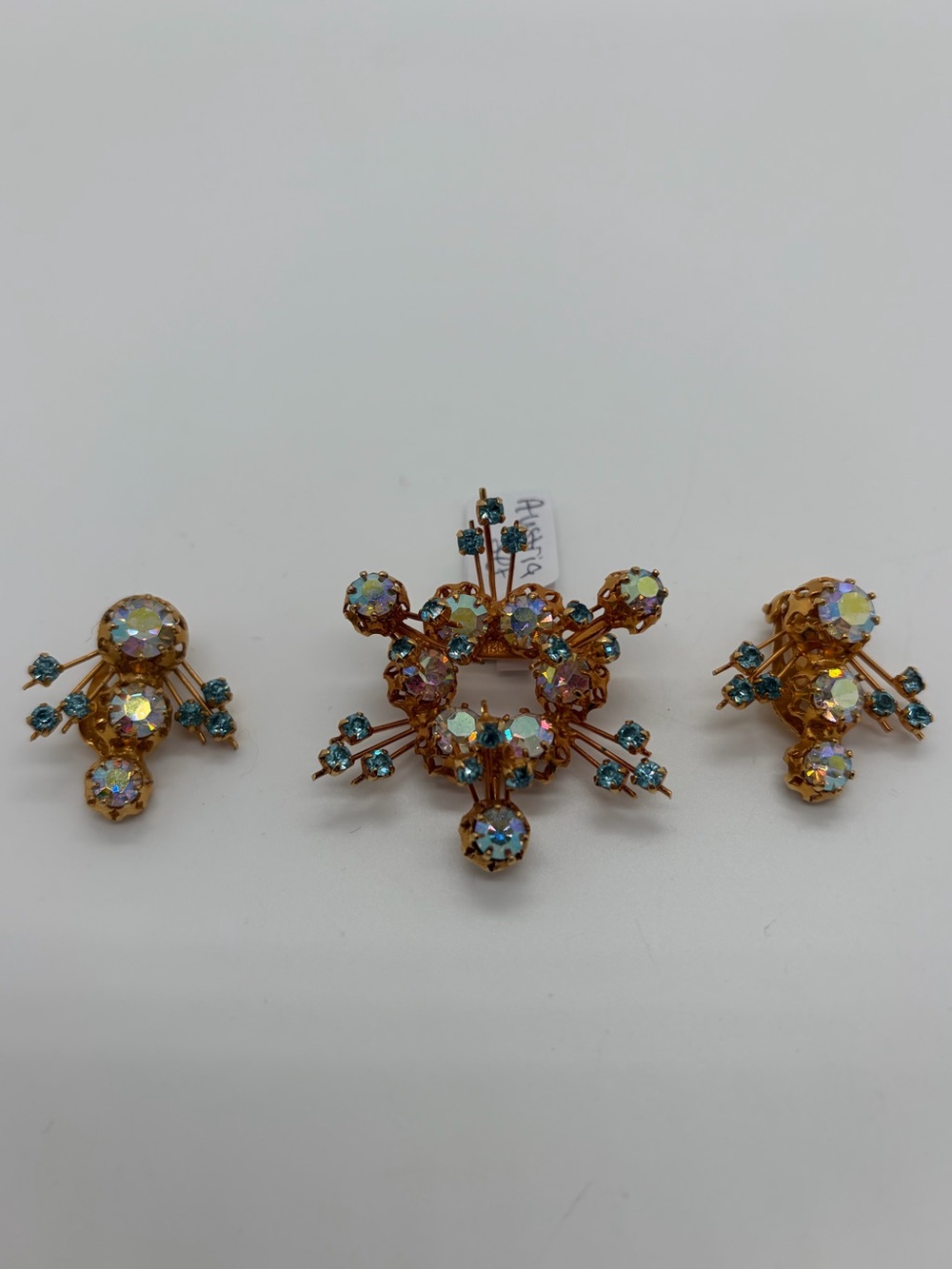 Vintage gold tone AB Austria crystal brooch and clip on set